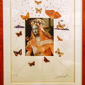Surrealistic portrait of Dalí surrounded by butterflies